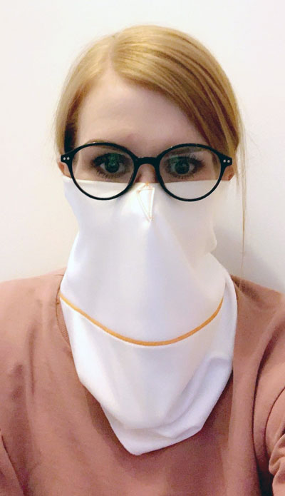 Face Gaiter in position Face Gaiter in position around the mouth and nose
